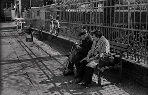 GDR, Berlin, 16. 4. 1988, elderly couple on a bench along the S-Bahn line at Daenenstrasse