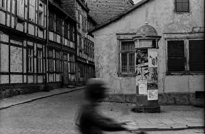 GDR, Halberstadt, 27.05.1988, half-timbered houses and moped riders