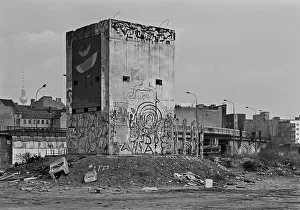 Former GDR watchtower after the fall of the Wall between the city railway and the Spree