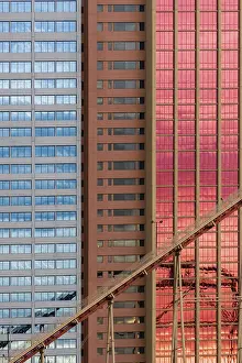 Geometrical patterns on building facade with sky and cloud reflections shot in Las Vegas
