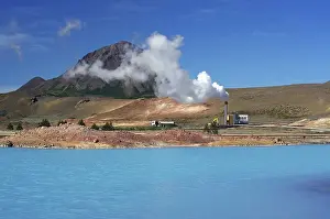 Geothermal lake and volcano, steam vapour