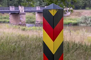German border post in front of a bridge over the Neisse in Prince Puckler Park