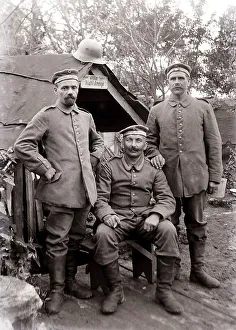 Three German soldiers in the camp