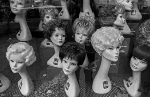 Germany, Berlin, 02.10.1991, Shop window with woman's heads