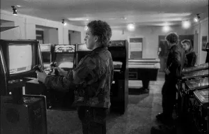 Germany, Berlin, 18.12.1990, gaming arcade in Wolliner Strasse