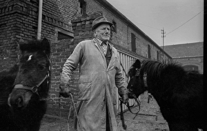 Germany, Kampehl, 01/02/1992, farmer with two horses, ponies, in Kampehl, Europe
