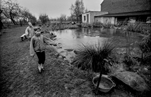 Germany, Kampehl, 01.02.1992, frozen pond, children, water tap, Europe