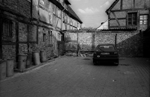 Germany, Perleberg, 30.04.1992, Backyard with rubbish bins and VW Golf, Europe