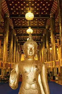 Gilded Buddha at the entrance of Wat Chedi Luang Temple