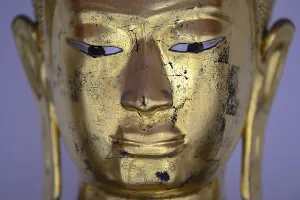 Gilded Buddha statue in Wat Pho