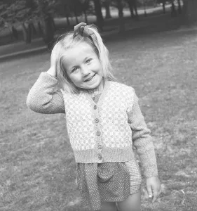 Girl in the 1940s. A charming and smiling girl is looking at the photographer. Sweden 1947. Kristoffersson V15-4
