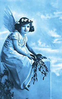 Girl as an angel with blue angel's wings