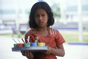 Girl with belly shop selling sweets in Iquitos