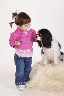 Girl with Cavalier King Charles Spaniel