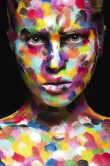 Girl with colored face painted