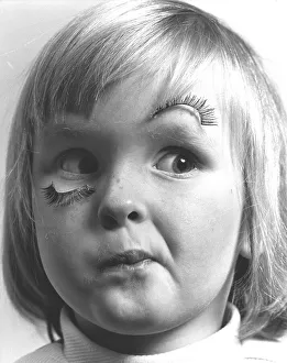 Girl with false eyelash, England, Great Britain