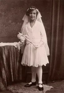 Girl at her First Communion, historical photo circa 1910