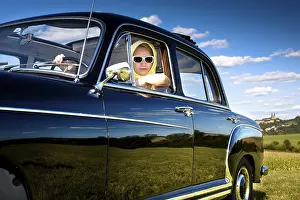 Girl in the Post-War classic car Mercedes Ponton 220SE Y