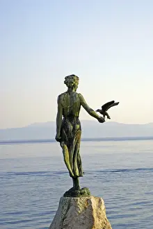 Girl with seagull, sculpture, Opatija