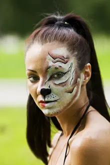 Girl with tigress make up close up portrait