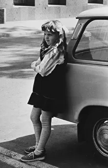 Girl with a Trabant 601 car, circa 1986