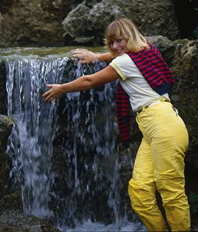 Girl at the waterfall