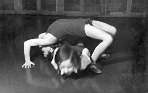 Two girls doing gymnastics, historical image