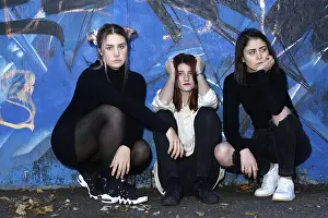 Three girls, teenagers, rebels