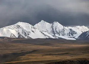 Glaciated and snow-capped mountains in the evening light