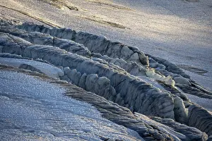 Glacier ice with crevasses in the evening light
