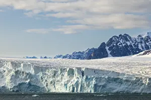 Glacier tongue, ice, edge in front of mountain peak