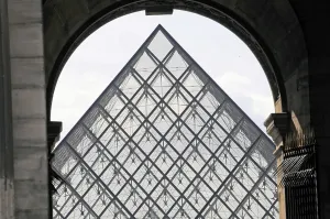 Glass pyramid of the Louvre, modern architectural landmark with a dramatic presence