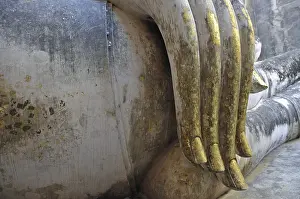 Gold leaf hand of a Buddha statue