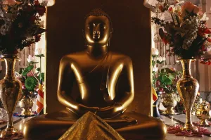 Golden acrylic statue of Buddha