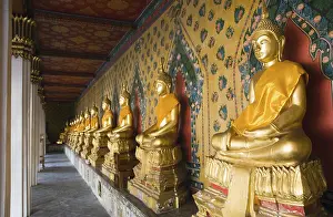 Golden Buddha statue in the Wat Arun Temple