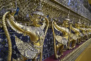 Category Buddhism Prints: Golden sculptures of Garuda and Naga