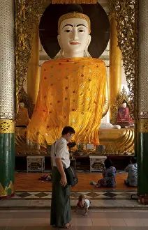 The golden stupa of the Shwedagon Pagoda rises almost 100 m (330ft)