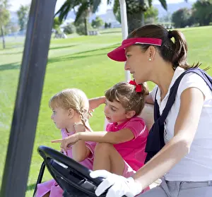 Category Historic EN Prints: Golf course family mother and daughters in buggy green grass field