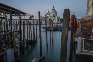 Gondola jetty, Venetian gondolas with the church of Santa Maria della Salute in the background