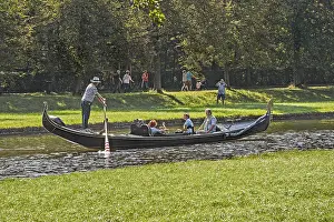 Gondola and visitors in Nymphenburg Palace Park