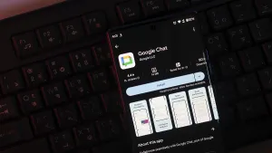 Google Chat app screen on smartphone over keyboard
