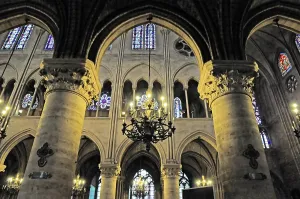 Gothic cathedral with magnificent columned arcades and decorative chandeliers