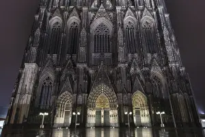 Gothic west facade of Cologne Cathedral at Night