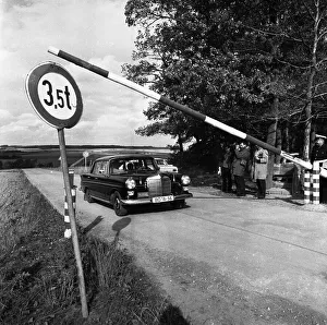 Government representatives with their vehicles in 1966 during a police check at the hitherto secret atomic bunker of