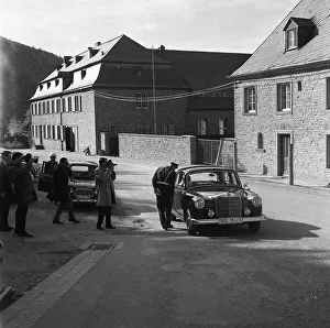 Government representatives with their vehicles in 1966 during a police check at the hitherto secret atomic bunker of
