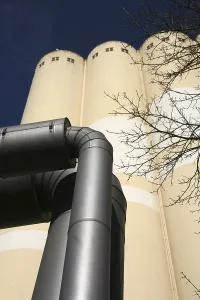 With grain silos of a mill