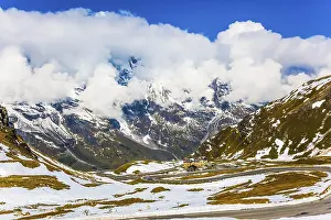 Framed Print : Grand Austrian Alps. The snow on the mountainside began to melt