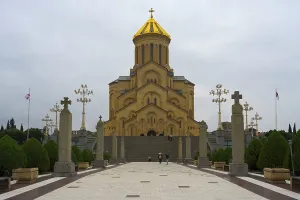 Framed Print : Grand cathedral with golden roof and stylish stone pillars against cloudy sky