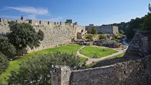 Grand Master's Palace, view of a medieval castle with courtyard and green lawn