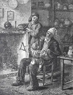 Grandfather playing with grandson on his knee